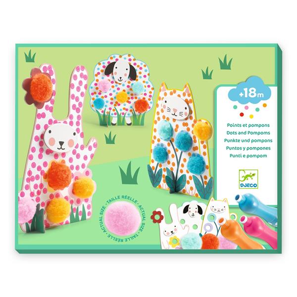 Image Des Points et des pompons - Dans l'herbe